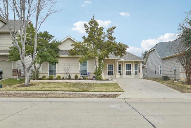 view of front of home with a front lawn and covered porch