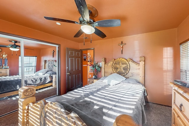 carpeted bedroom featuring ceiling fan