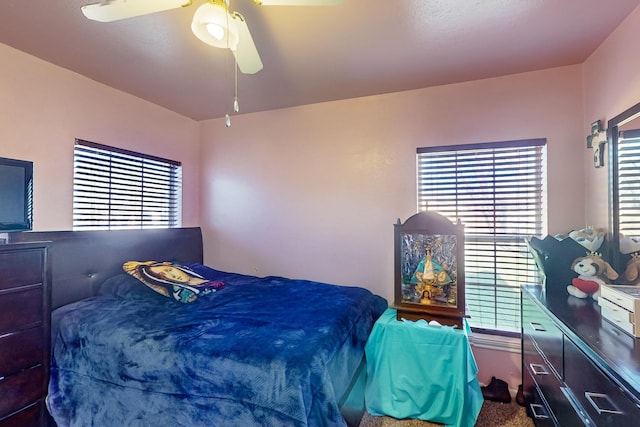 bedroom with carpet flooring and ceiling fan