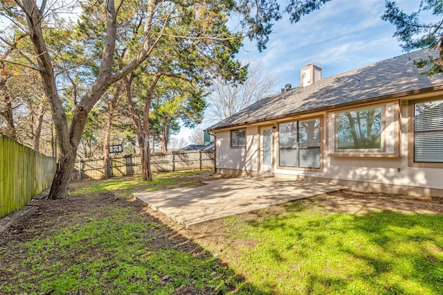 view of yard with a patio area