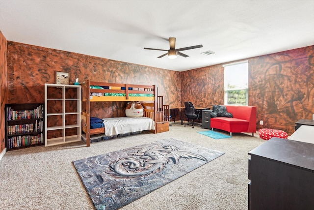 bedroom with ceiling fan and carpet floors