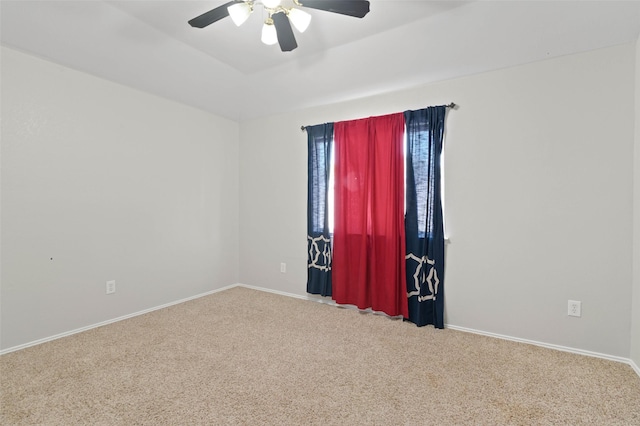 empty room featuring ceiling fan and carpet floors