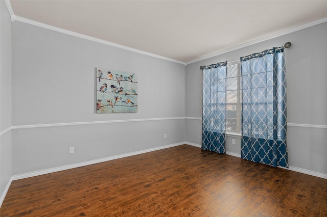 empty room with crown molding and dark wood-type flooring