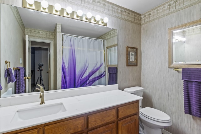 bathroom with vanity, a shower with curtain, and toilet