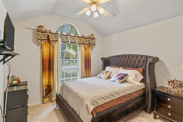 carpeted bedroom with vaulted ceiling and ceiling fan