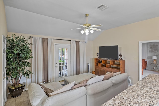 living room featuring lofted ceiling and ceiling fan