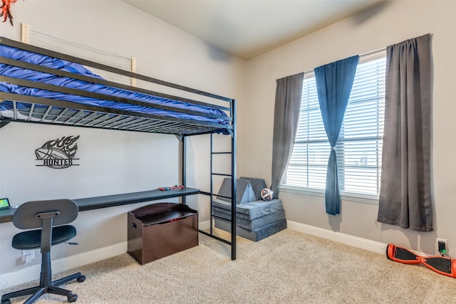 bedroom with light carpet