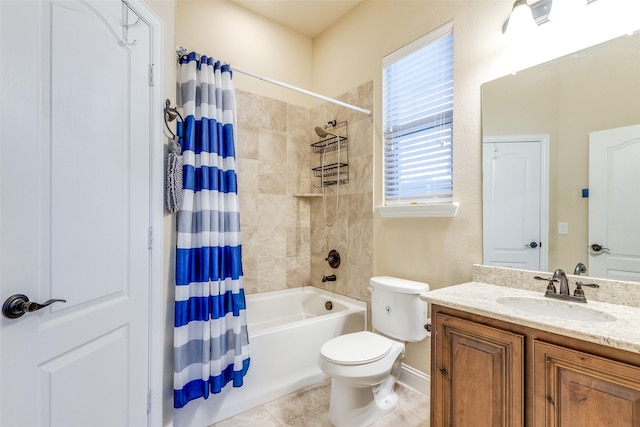 full bathroom with toilet, shower / bath combo with shower curtain, tile patterned floors, and vanity