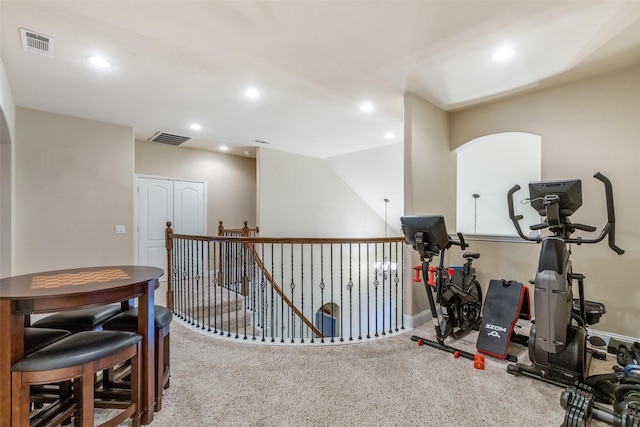 exercise room with carpet floors