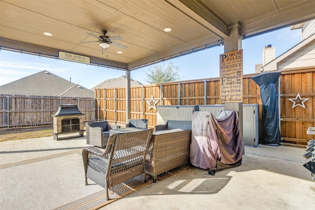 view of patio with ceiling fan and outdoor lounge area