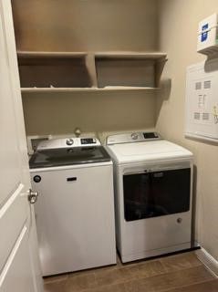 washroom with washer and dryer