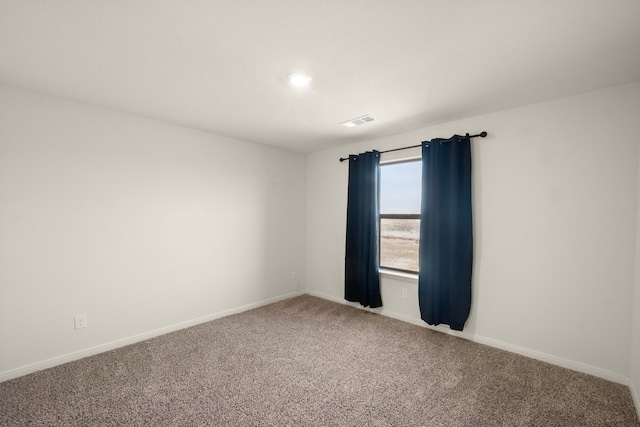 view of carpeted spare room