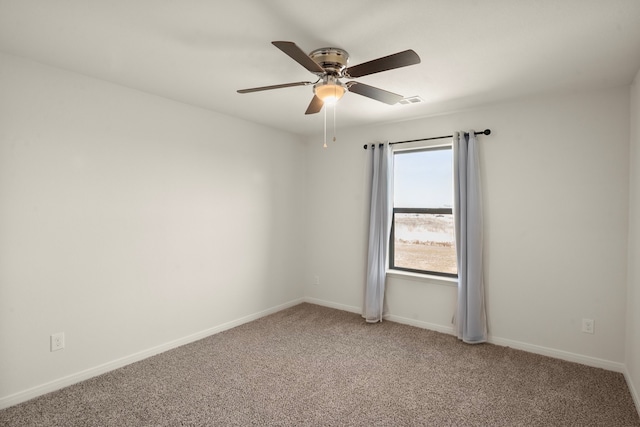 unfurnished room with carpet floors and ceiling fan