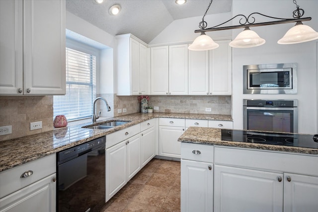 kitchen featuring white cabinets, sink, decorative light fixtures, and black appliances