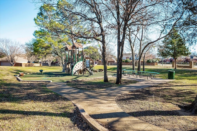 surrounding community featuring a yard and a playground