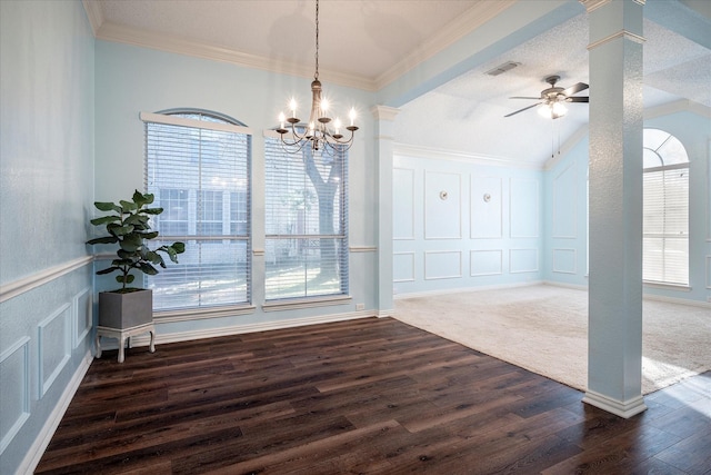 empty room with dark hardwood / wood-style floors, plenty of natural light, a textured ceiling, and ceiling fan with notable chandelier