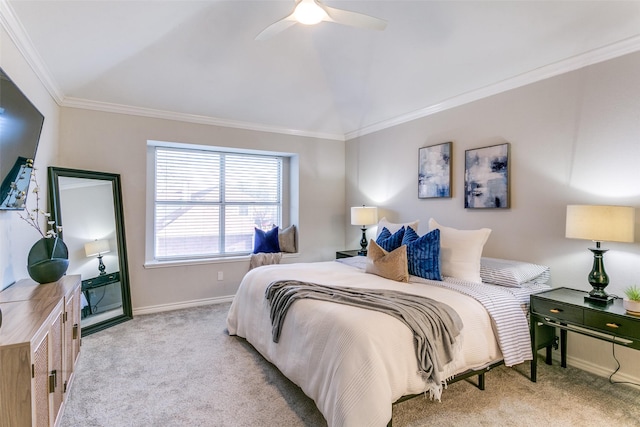 bedroom featuring ceiling fan, light colored carpet, and ornamental molding