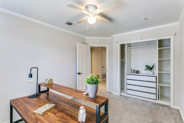 office area featuring carpet, ceiling fan, and crown molding