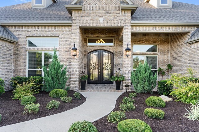 french country style house with a front yard