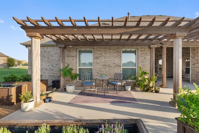 view of patio featuring a large fireplace