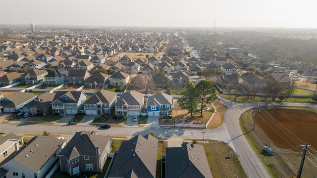 birds eye view of property with a residential view