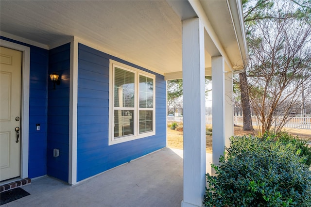 entrance to property with a porch