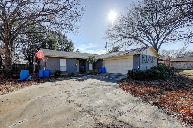 ranch-style home with a garage