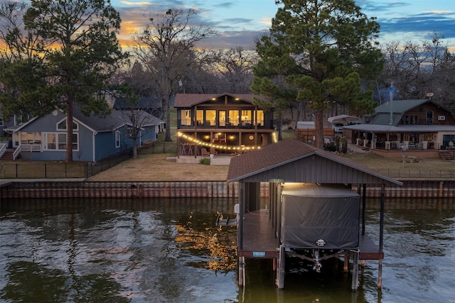 view of dock with a water view