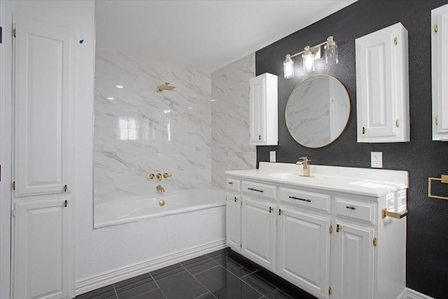 bathroom featuring vanity and tiled shower / bath