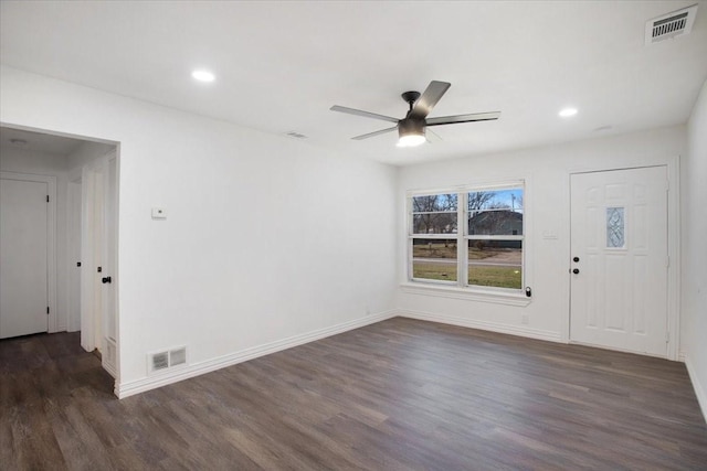 foyer featuring ceiling fan and dark hardwood / wood-style flooring