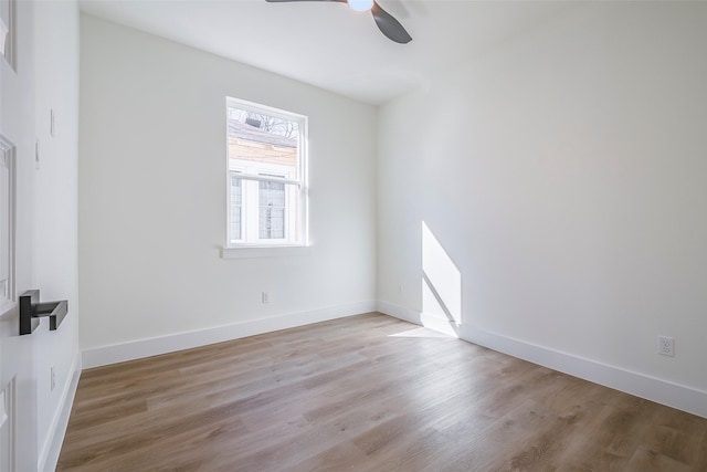 unfurnished room with light hardwood / wood-style flooring and ceiling fan