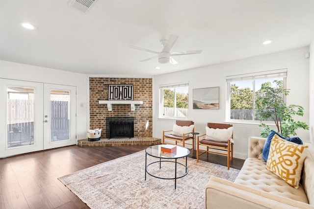 living room featuring ceiling fan, french doors, and plenty of natural light