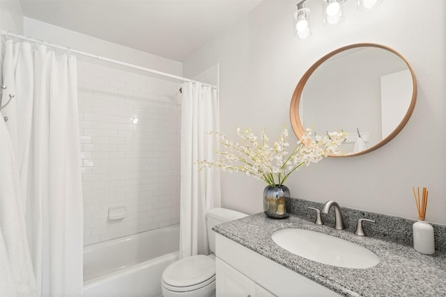 full bathroom featuring vanity, toilet, and shower / tub combo with curtain