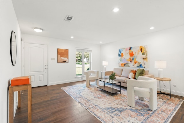 living room featuring dark hardwood / wood-style flooring