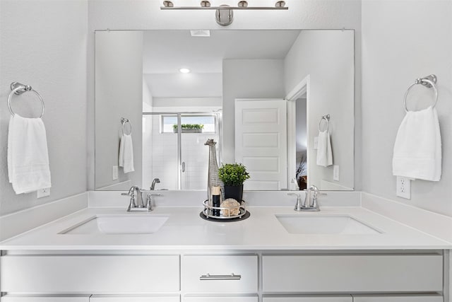 bathroom featuring vanity and walk in shower