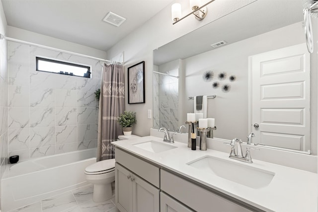 full bathroom with shower / tub combo with curtain, vanity, and toilet