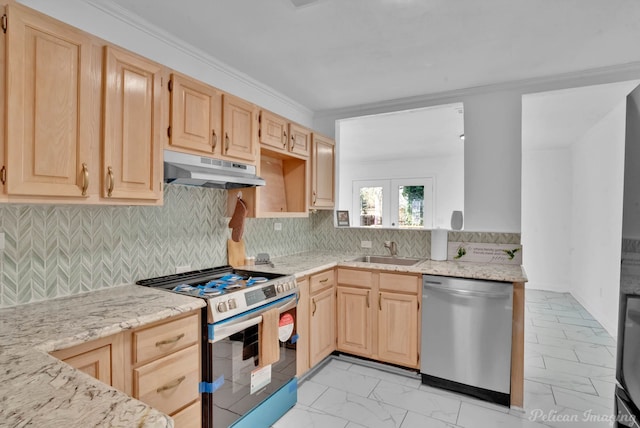 kitchen with sink, stainless steel appliances, and light brown cabinets