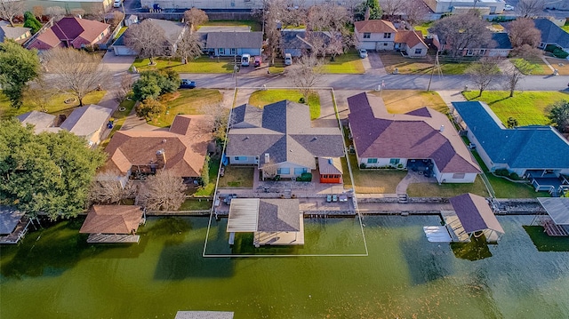 drone / aerial view with a water view