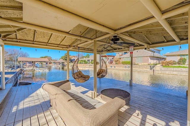 dock area with a water view