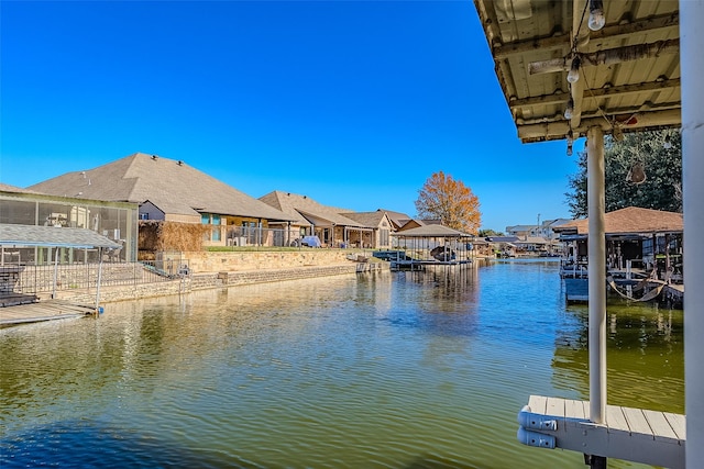 dock area with a water view