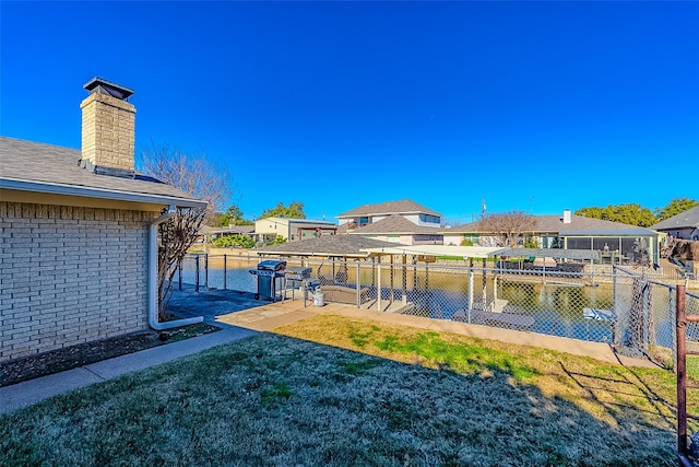 view of yard with a water view