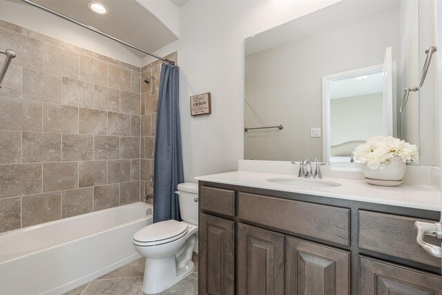 bedroom with ensuite bath and light colored carpet