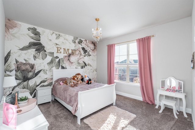 bedroom featuring a chandelier, carpet flooring, and baseboards