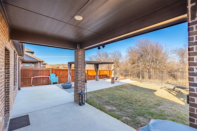 view of patio featuring a fenced backyard