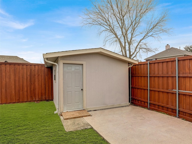 view of outdoor structure featuring a yard