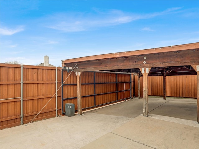 view of patio / terrace featuring a carport