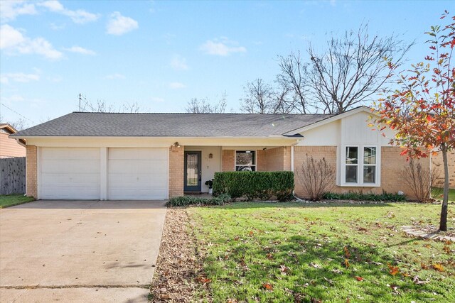 ranch-style home with a porch, a garage, and a front lawn