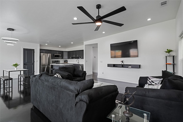 living room with ceiling fan