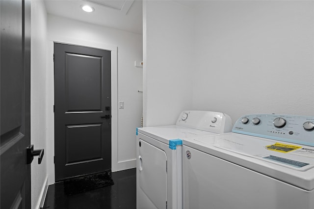 laundry room with separate washer and dryer