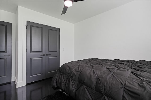 bedroom featuring a closet and ceiling fan